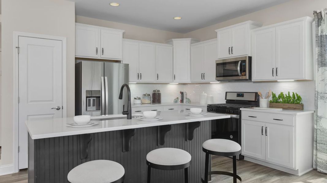 Furnished interior view inside a new home in Sidney Creek Single Family, Zebulon (Image 12).