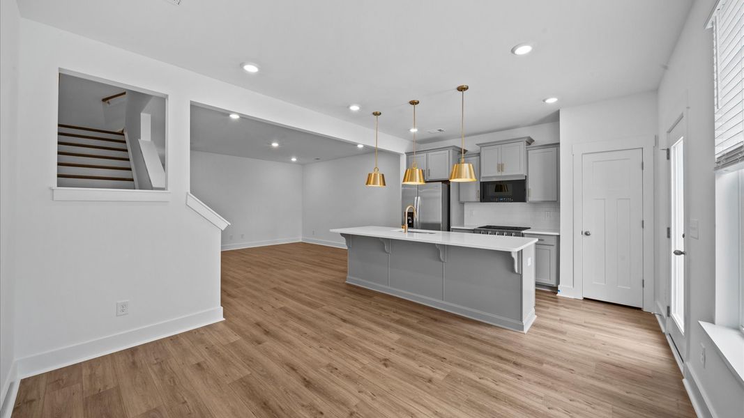 Open concept breakfast area in two story townhome at Ransdell Pointe by DRB Homes in Spartanburg, SC