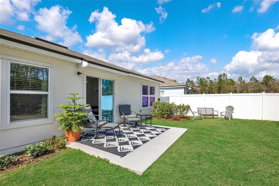 Exterior details and patio area of a home in Sawmill Branch, Palm Coast (Image 25).