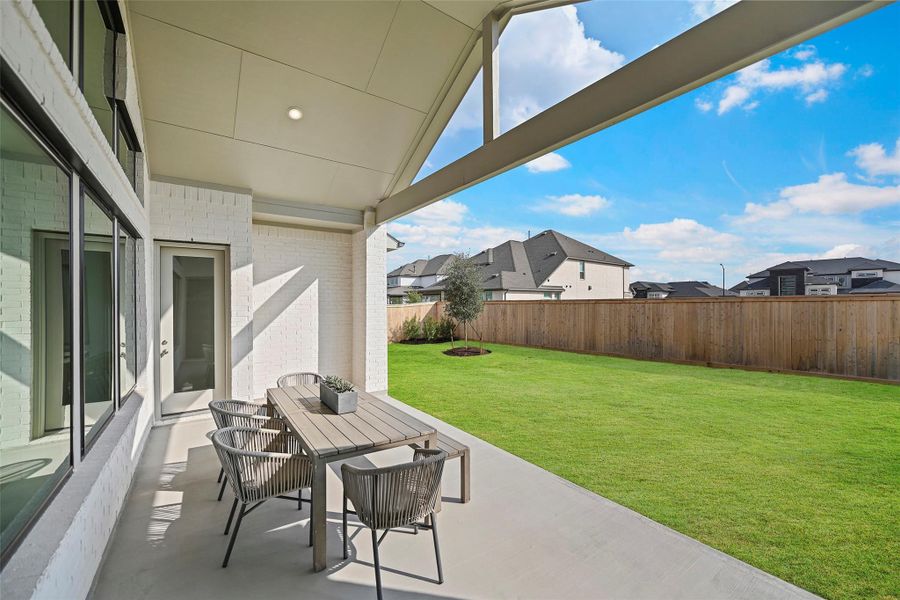 Exterior details and patio area of a home in Bridgeland 70′, Cypress (Image 2).