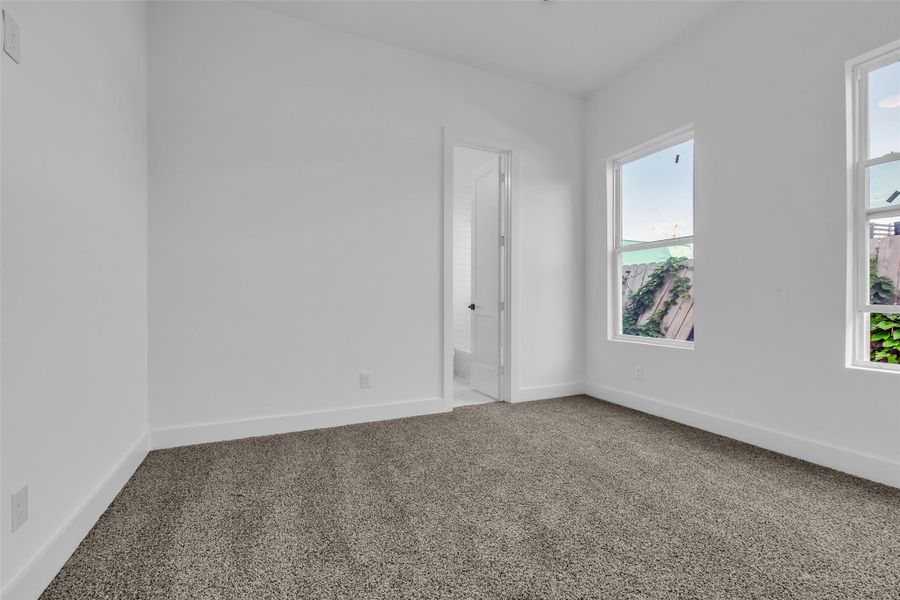 Endless possibilities await in thisflexible space! Carpeted forcomfort and bathed in naturallight, perfect for a home office,playroom, or cozy lounge. Endless possibilities await in thisflexible space! Carpeted forcomfort and bathed in naturallight, perfect for a home office,playroom, or cozy lounge.