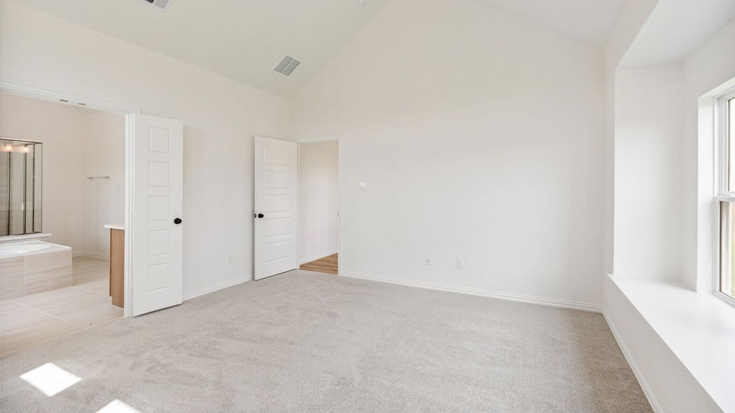 Furnished interior view inside a new home in Creekhaven, Iowa Colony (Image 17).