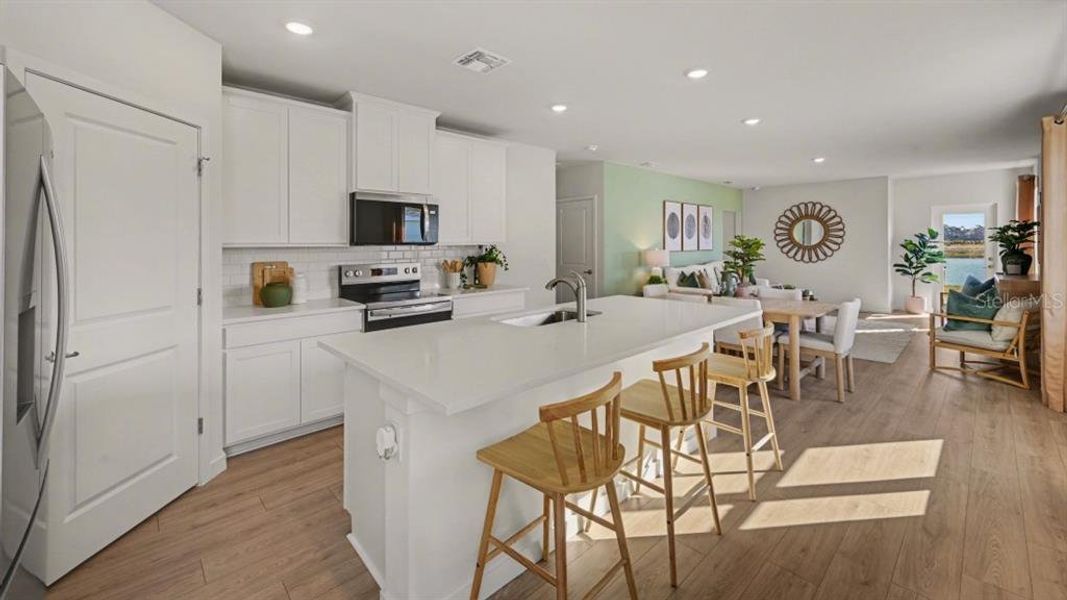 Furnished interior view inside a new home in Driftwood Bay, Port Charlotte (Image 11).