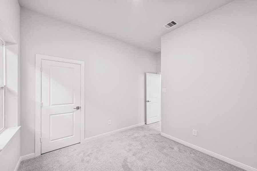 Spacious, unfurnished interior of a new home in The Grand Prairie 50’, Hockley (Image 18).