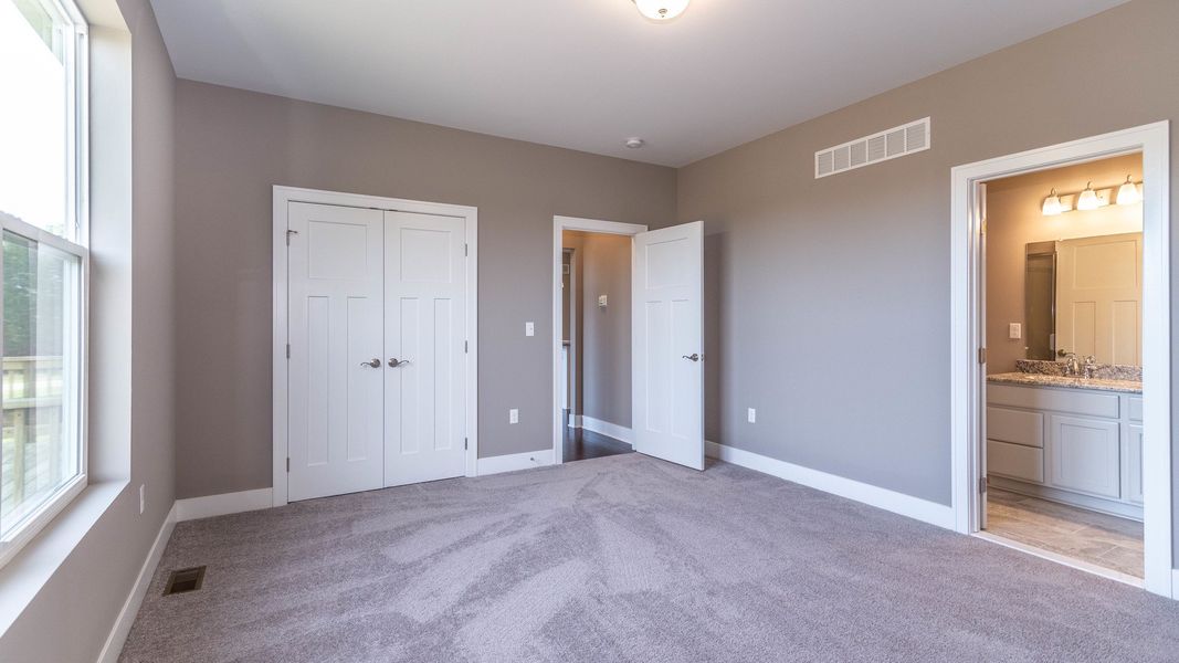 Representative unfurnished interior of a home built from the The Boulder Side Entry by Norfolk Homes in The Grande Estates, Jackson (Image 23).