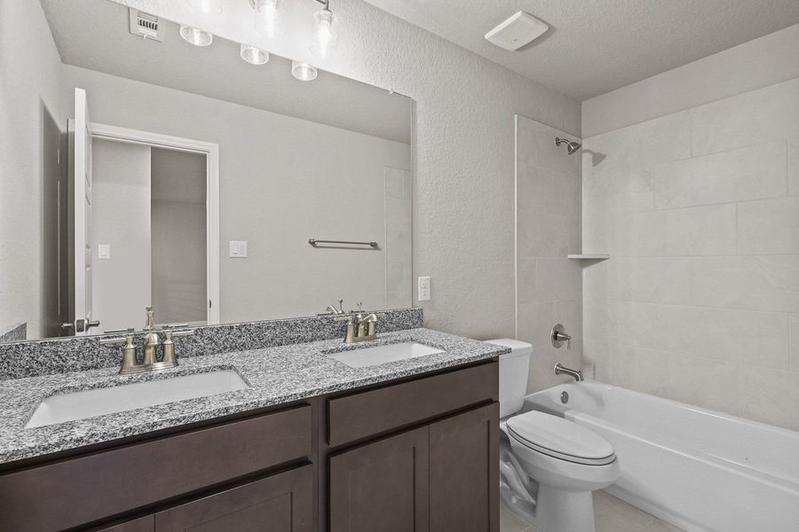 Representative furnished interior of a home built from the The Jennings G by Davidson Homes LLC in The Reserve at Potranco Oaks, Castroville (Image 33).
