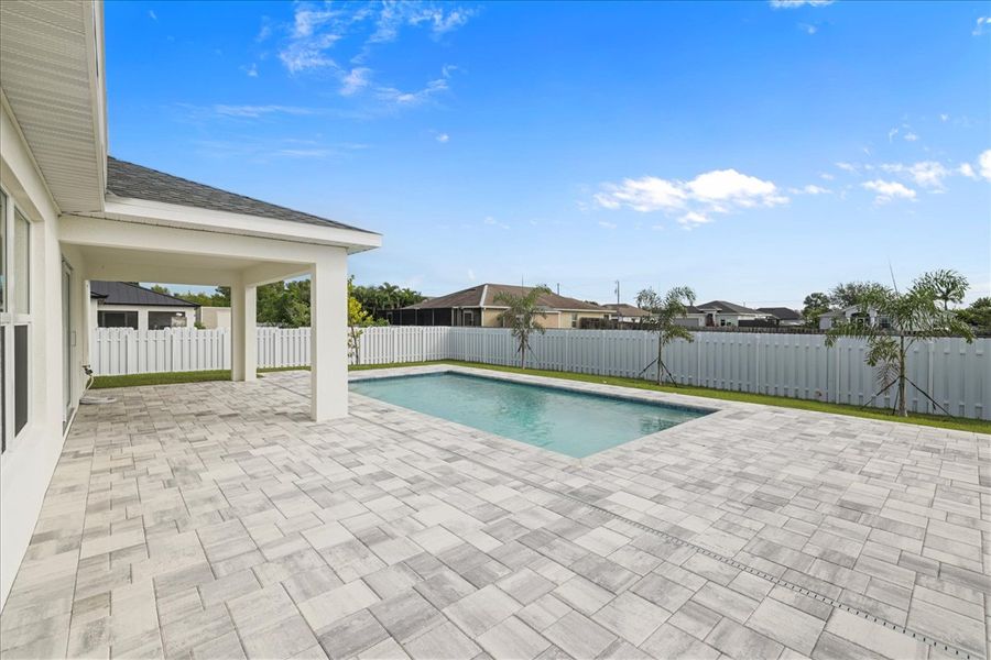 Representative exterior details of a home built from the The Sunset Harbor with Pool by Sunlife Homes LLC in Cape Coral, Cape Coral (Image 27). Representative exterior details of a home built from the The Sunset Harbor with Pool by Sunlife Homes LLC in Cape Coral, Cape Coral (Image 27).