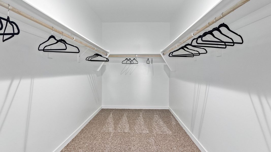 Representative unfurnished interior of a home built from the Citrine - Plan 5042 by D.R. Horton in Tortolita Trails, Marana (Image 17).