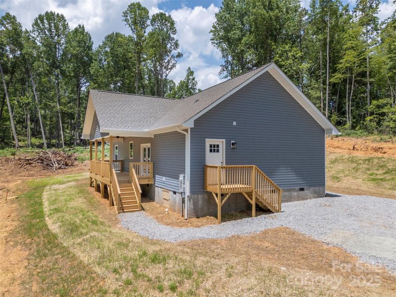 Front exterior of a new home in , Flat Rock, NC, highlighting curb appeal (Image 15).