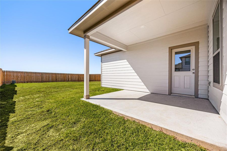 The backyard offers a private, low-maintenance space with a covered patio—perfect for relaxing, entertaining, or enjoying outdoor living. The backyard offers a private, low-maintenance space with a covered patio—perfect for relaxing, entertaining, or enjoying outdoor living.