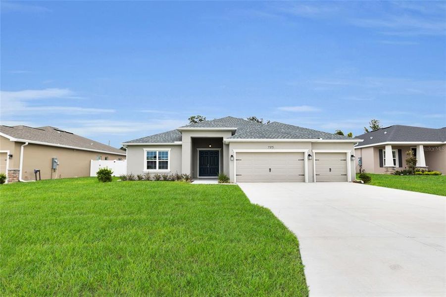 Front exterior of a new home in , Ocala, FL, highlighting curb appeal (Image 29).