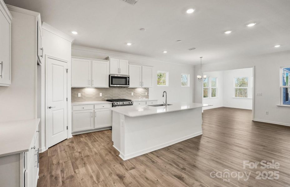 Furnished interior view inside a new home in Bryton, Huntersville (Image 7).