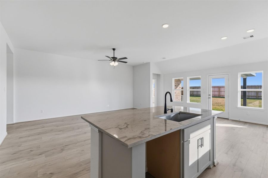 Furnished interior view inside a new home in Creekhaven, Iowa Colony (Image 5).