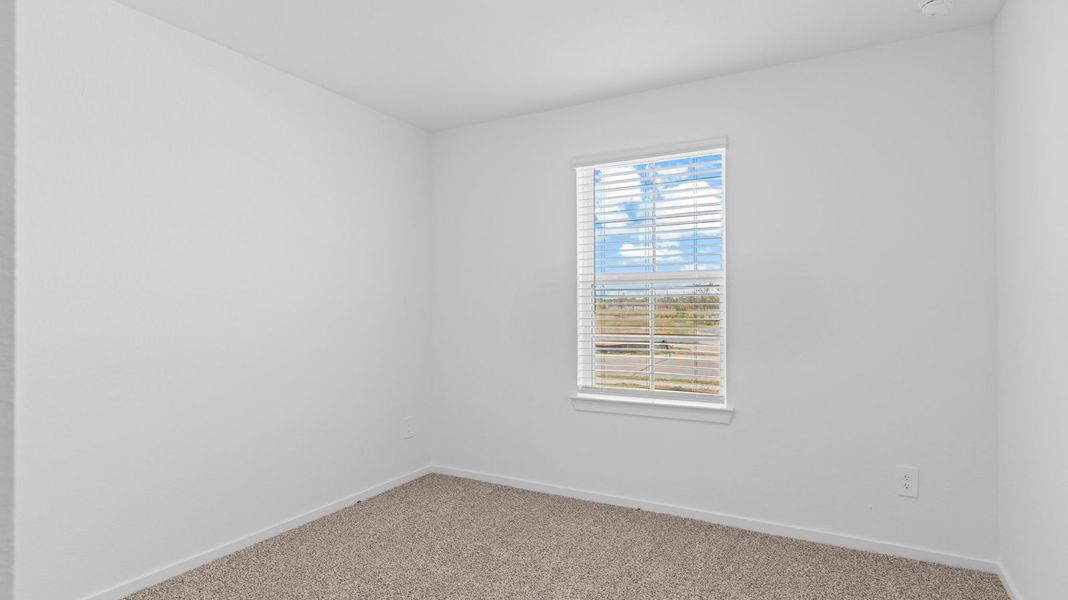 Spacious, unfurnished interior of a new home in Caldwell Crossing, Iowa Colony (Image 20).