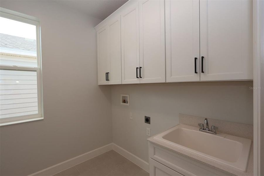 Furnished interior view inside a new home in Lake Star at Ovation, Winter Garden (Image 11).