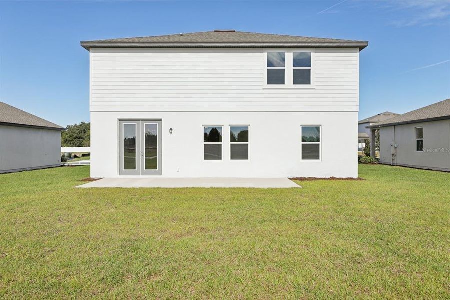 Exterior details and patio area of a home in Tyson Reserve, St. Cloud (Image 17).