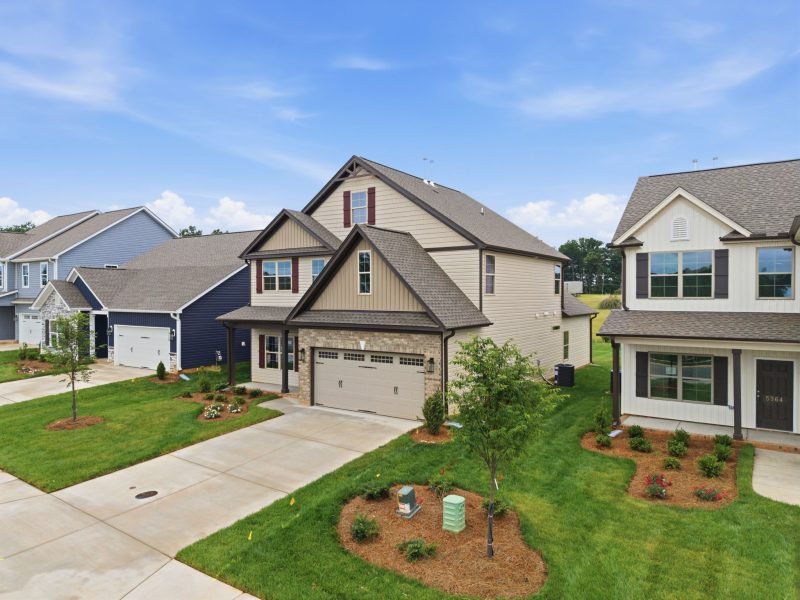Front exterior of a new home in Sullivans Reserve, Walkertown, NC, highlighting curb appeal (Image 27).