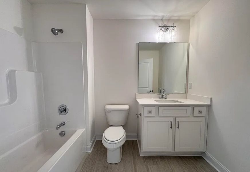 Furnished interior view inside a new home in Country Club Creek, Ayden (Image 7).