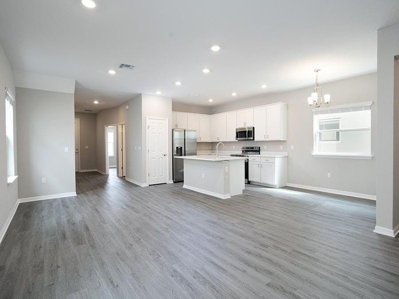 Enjoy an open living area with LVP flooring. Enjoy an open living area with LVP flooring.