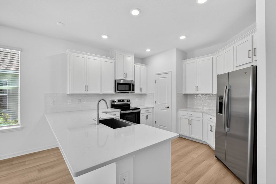 Furnished interior view inside a new home in Westview Community Group Page, Poinciana (Image 5).