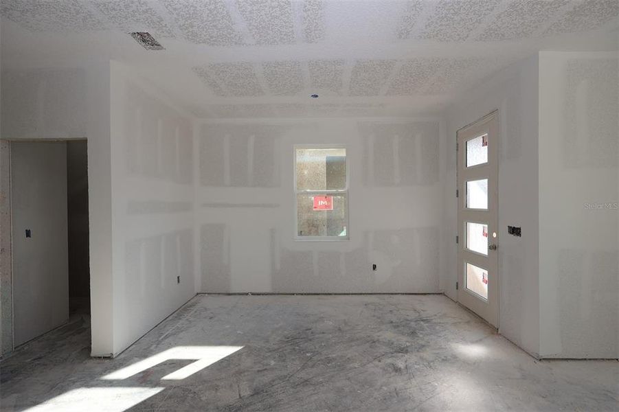 In-progress construction of a new home in Lake Star at Ovation, Winter Garden, FL (Image 30).