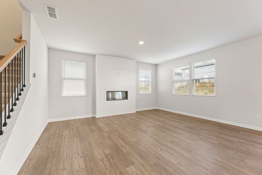 A room with a wood floor and a wood floor. A room with a wood floor and a wood floor.