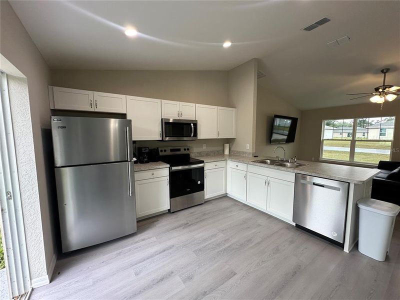 Furnished interior view inside a new home in , Dunnellon (Image 10).