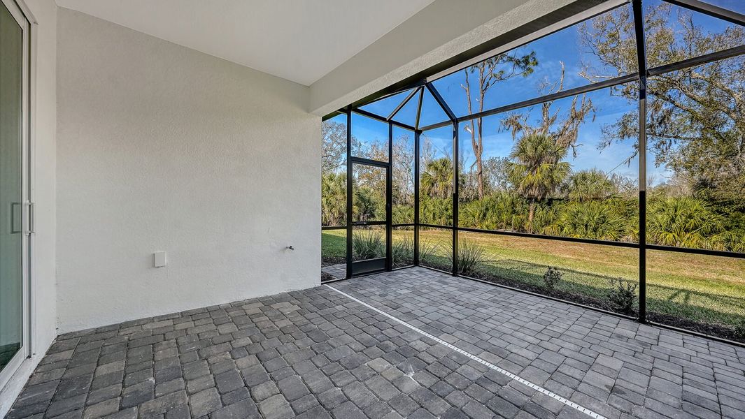 Exterior details and patio area of a home in Wildleaf, Parrish (Image 4).