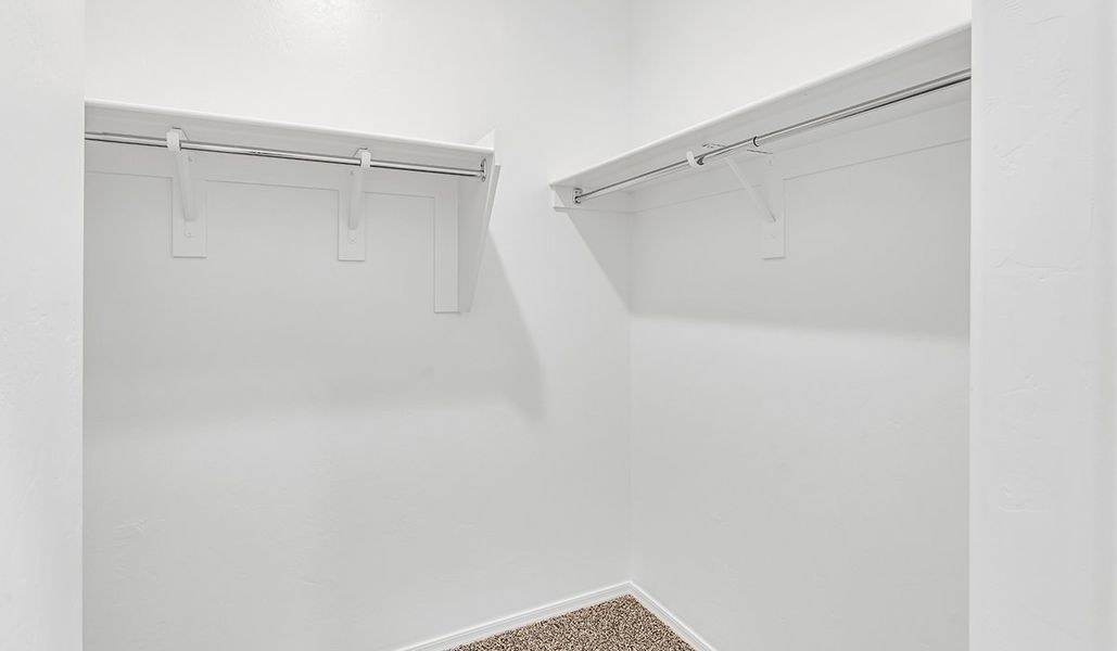 Spacious, unfurnished interior of a new home in Coronet at Gladden Farms, Marana (Image 27). Spacious, unfurnished interior of a new home in Coronet at Gladden Farms, Marana (Image 27).