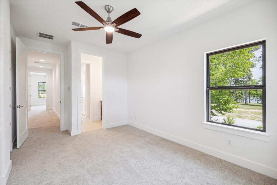 Secondary Bedroom (1 of 4) with Hollywood Bath Secondary Bedroom (1 of 4) with Hollywood Bath