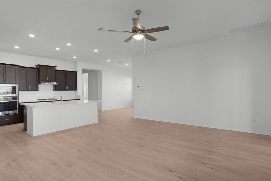 Furnished interior view inside a new home in The Grove at Blackhawk, Pflugerville (Image 43). Furnished interior view inside a new home in The Grove at Blackhawk, Pflugerville (Image 43).