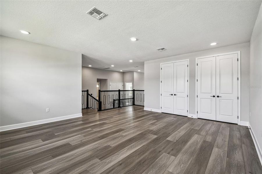 Spacious, unfurnished interior of a new home in Solace at Corner Lake, Orlando (Image 43).