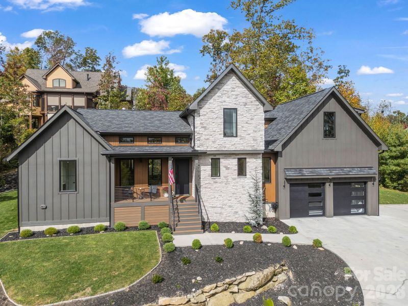 Front exterior of a new home in , Hendersonville, NC, highlighting curb appeal (Image 24).