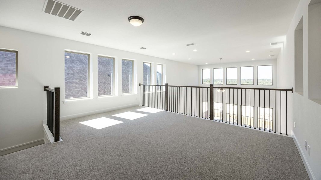 Spacious, unfurnished interior of a new home in Eldorado At Santa Rita Ranch 50', Liberty Hill (Image 14).