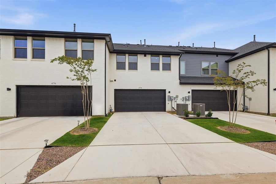 Front exterior of a new home in , Arlington, TX, highlighting curb appeal (Image 20).
