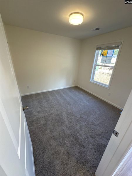 Spacious, unfurnished interior of a new home in Piney Woods Bluff, Columbia (Image 11).