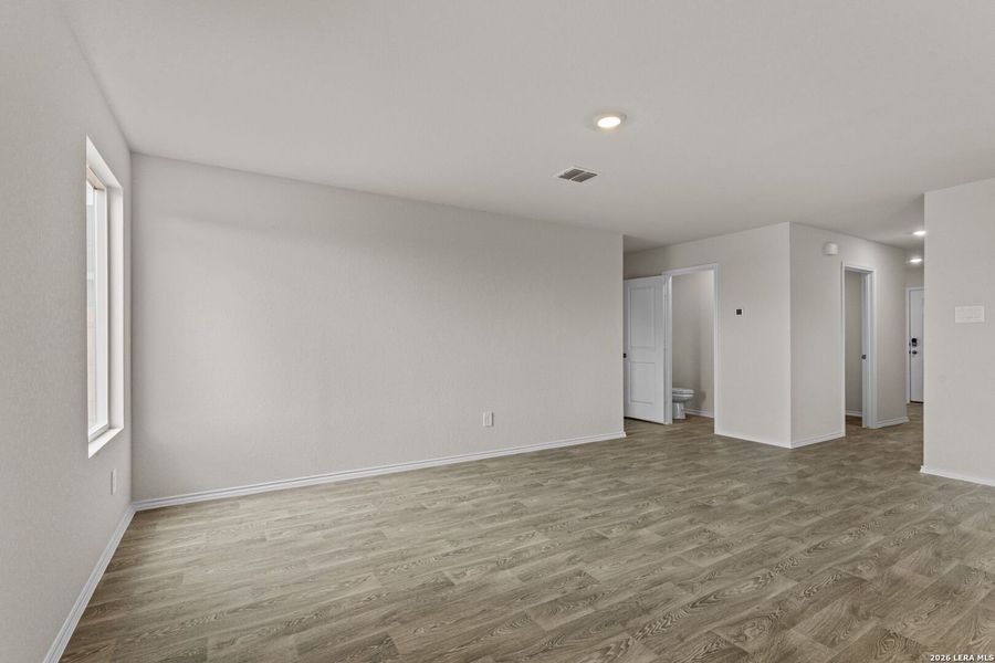 Spacious, unfurnished interior of a new home in Swenson Heights, Seguin (Image 32).