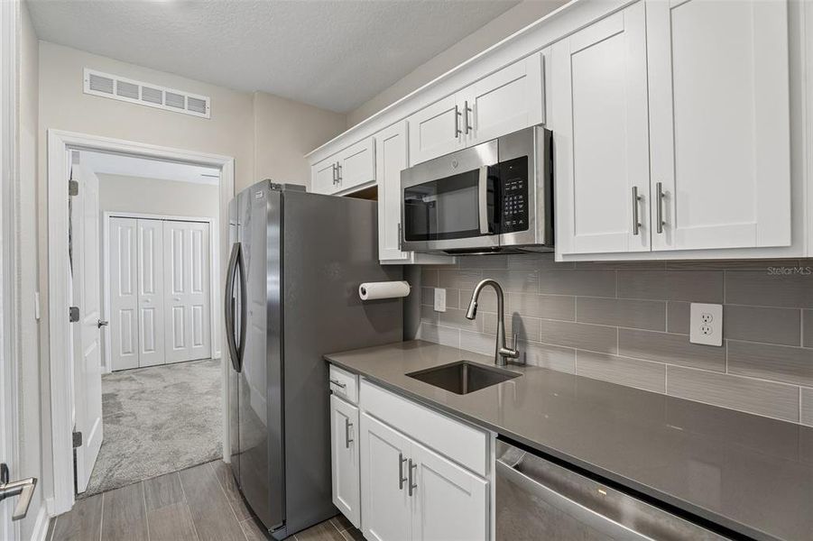 Furnished interior view inside a new home in Bridgewalk, St. Cloud (Image 32).