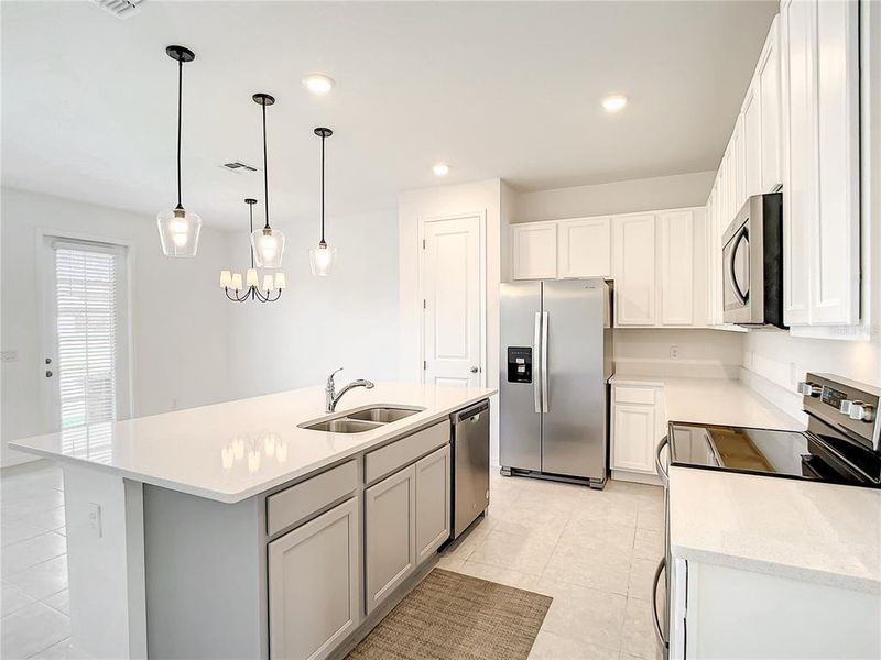 Furnished interior in a model home at The Enclaves at Festival Cove in Davenport (Image 17).