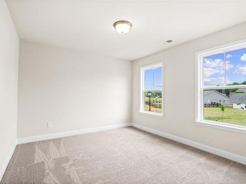 Spacious, unfurnished interior of a new home in Wehunt Meadows, Hoschton (Image 33).