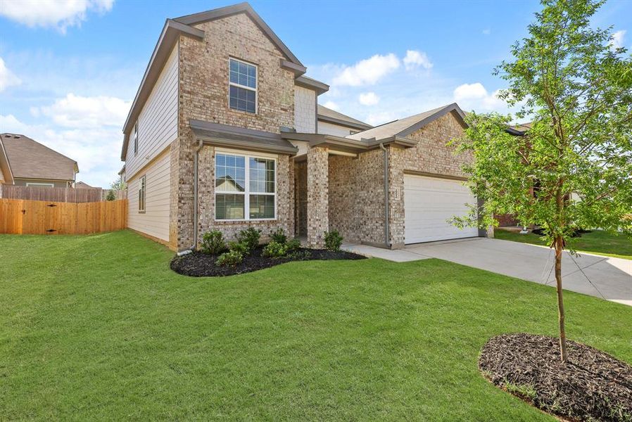 Front exterior of a new home in Deer Creek, Fort Worth, TX, highlighting curb appeal (Image 25). Front exterior of a new home in Deer Creek, Fort Worth, TX, highlighting curb appeal (Image 25).