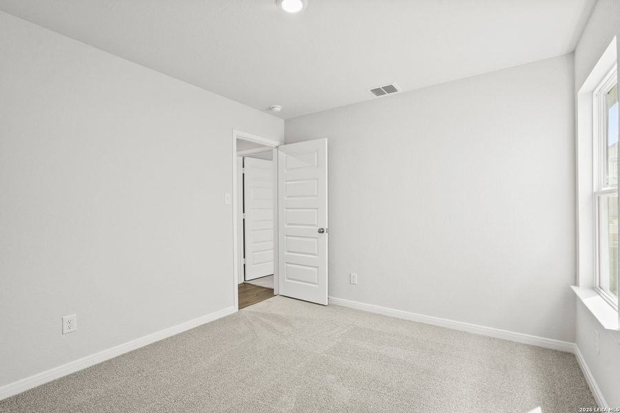 Spacious, unfurnished interior of a new home in Hickory Ridge, Elmendorf (Image 22).