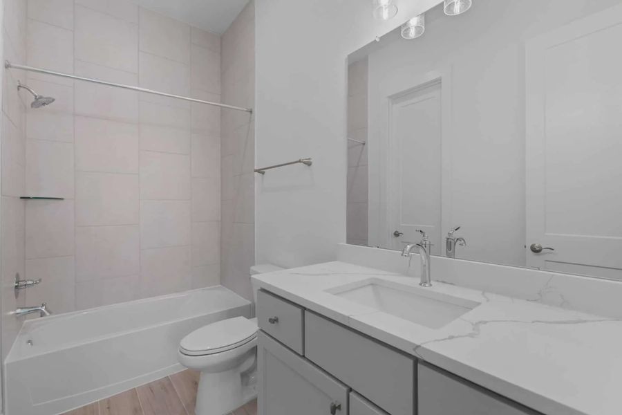 Representative furnished interior of a home built from the Lakeway by Chesmar Homes in Meridiana 50's, Manvel (Image 13).