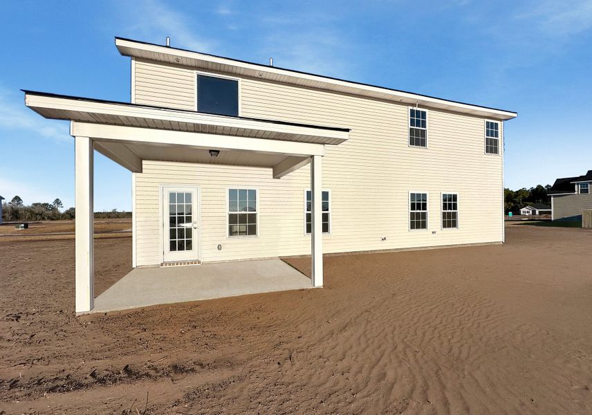 Exterior details and patio area of a home in The Village at Sassafras, Allenhurst (Image 2).