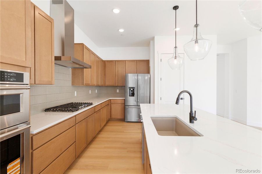 Furnished interior view inside a new home in Dillon Pointe - Journey, Broomfield (Image 8).