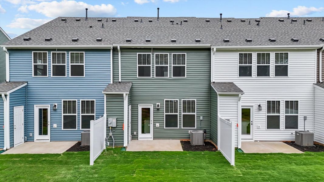 Exceptional outdoor living begins with this private backyard in this thoughtfully designed townhome at Ransdell Pointe