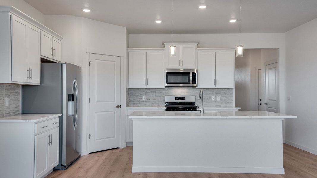 Furnished interior view inside a new home in Trails at Crowfoot, Parker (Image 4).