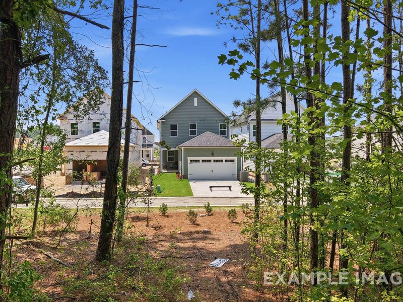 Front exterior of a new home in Forestville Yard, Knightdale, NC, highlighting curb appeal (Image 1). Front exterior of a new home in Forestville Yard, Knightdale, NC, highlighting curb appeal (Image 1).