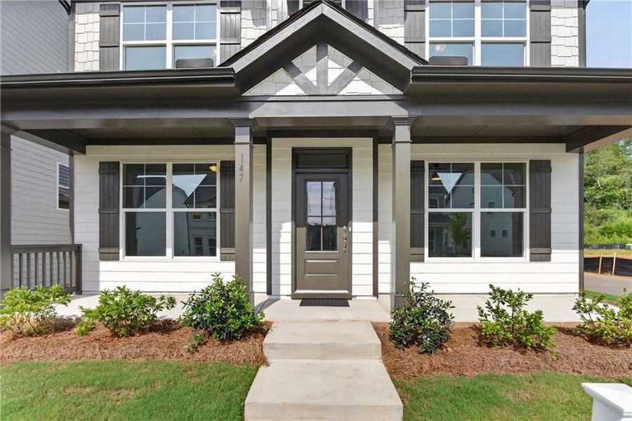 Exterior details and patio area of a home in Marble Tree, Ball Ground (Image 3).