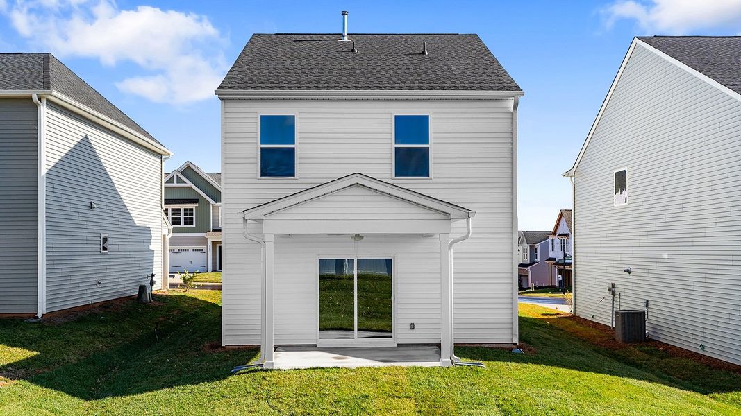 Exterior details and patio area of a home in Hanes Lake, Winston-Salem (Image 3).